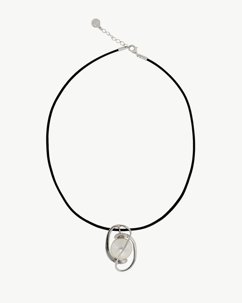 Full view of necklace with oval pearl pendant and black cord, centered on white background.