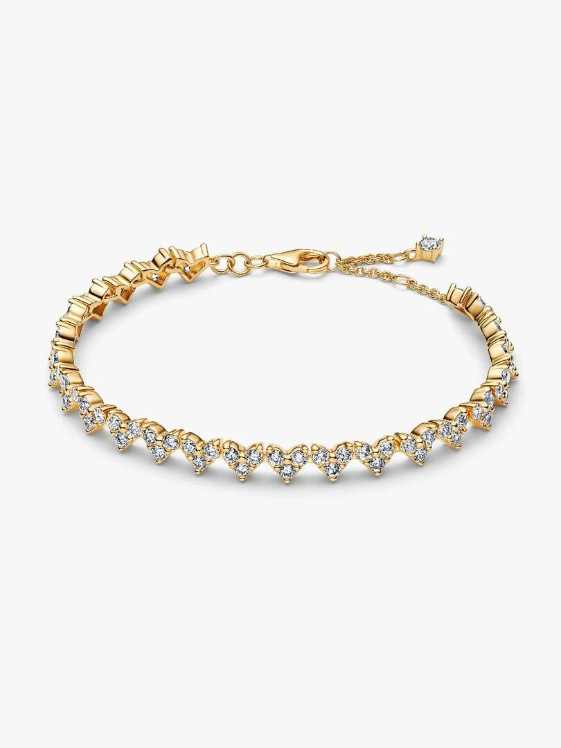 Front view of the gold-tone heart motif bracelet with cubic zirconia on a white background.