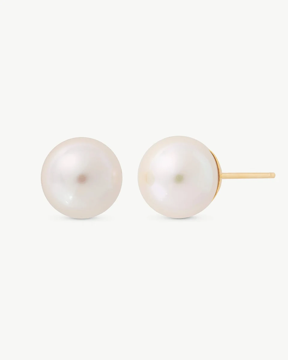 Front view of pearl stud earrings on a white background, showing the gold post side profile.