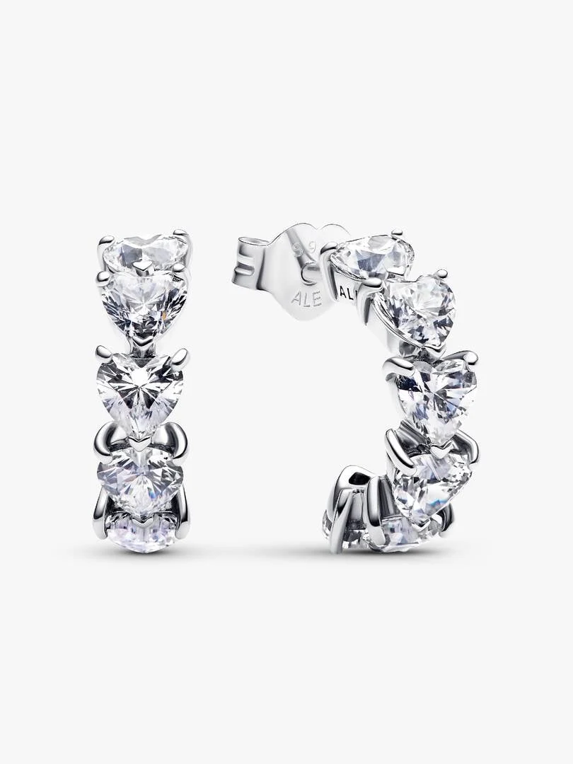Front view of heart hoop earrings on a white background, focusing on the cubic zirconia brilliance.