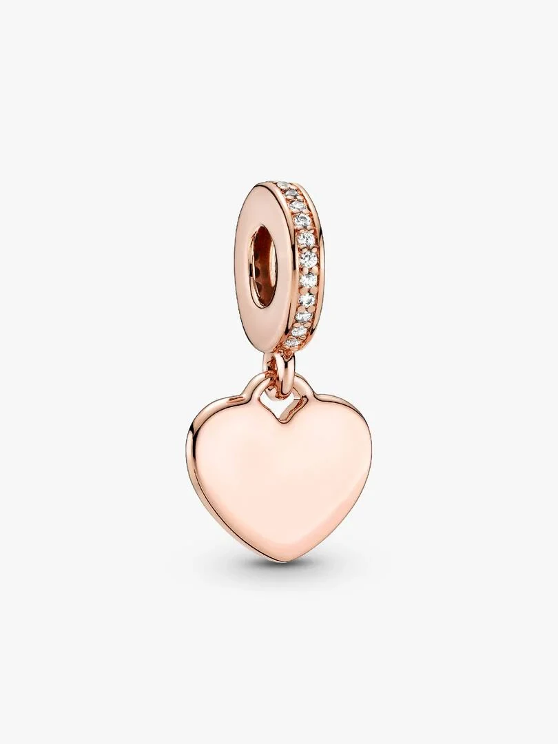 Front view of rose gold heart charm with pavé cubic zirconia ring on a white background.