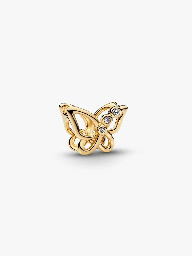 Gold butterfly charm side view, white background, showing filigree design and cubic zirconia details.