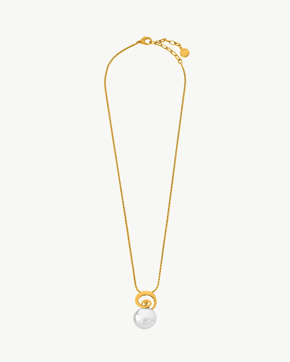 Full view of pearl pendant necklace on white background, front shot with extended chain.