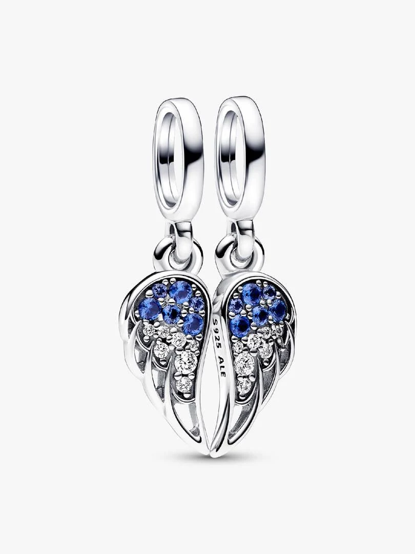 Front view of the two wing charms, white background, detail of blue cubic zirconia and silver.