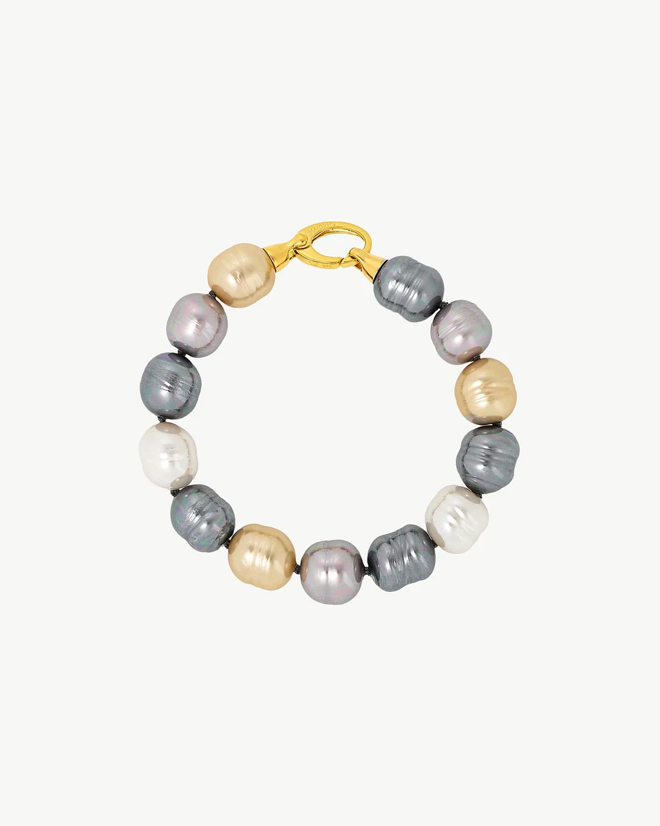 Baroque pearl bracelet arranged in a circle, front view on a pure white background.