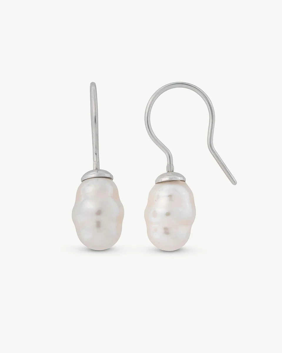 Pair of baroque pearl drop earrings with hook closures, front view on a white background.