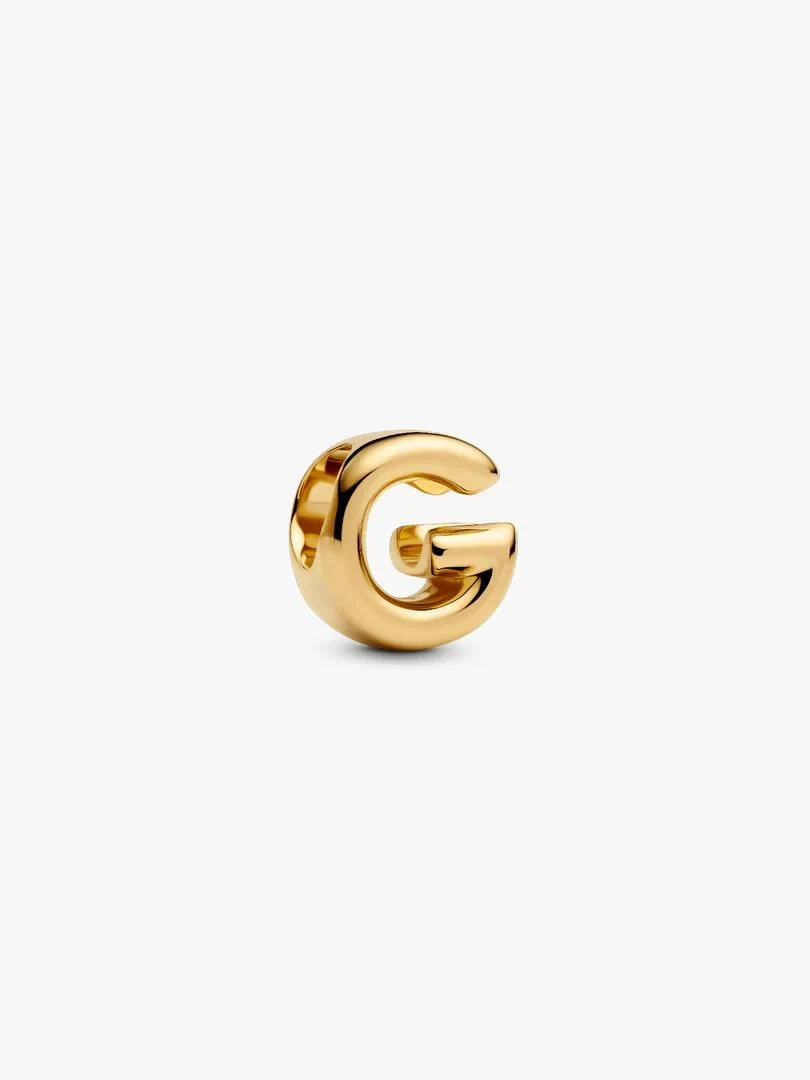 Gold-tone letter G charm, front three-quarter view on a solid white background.