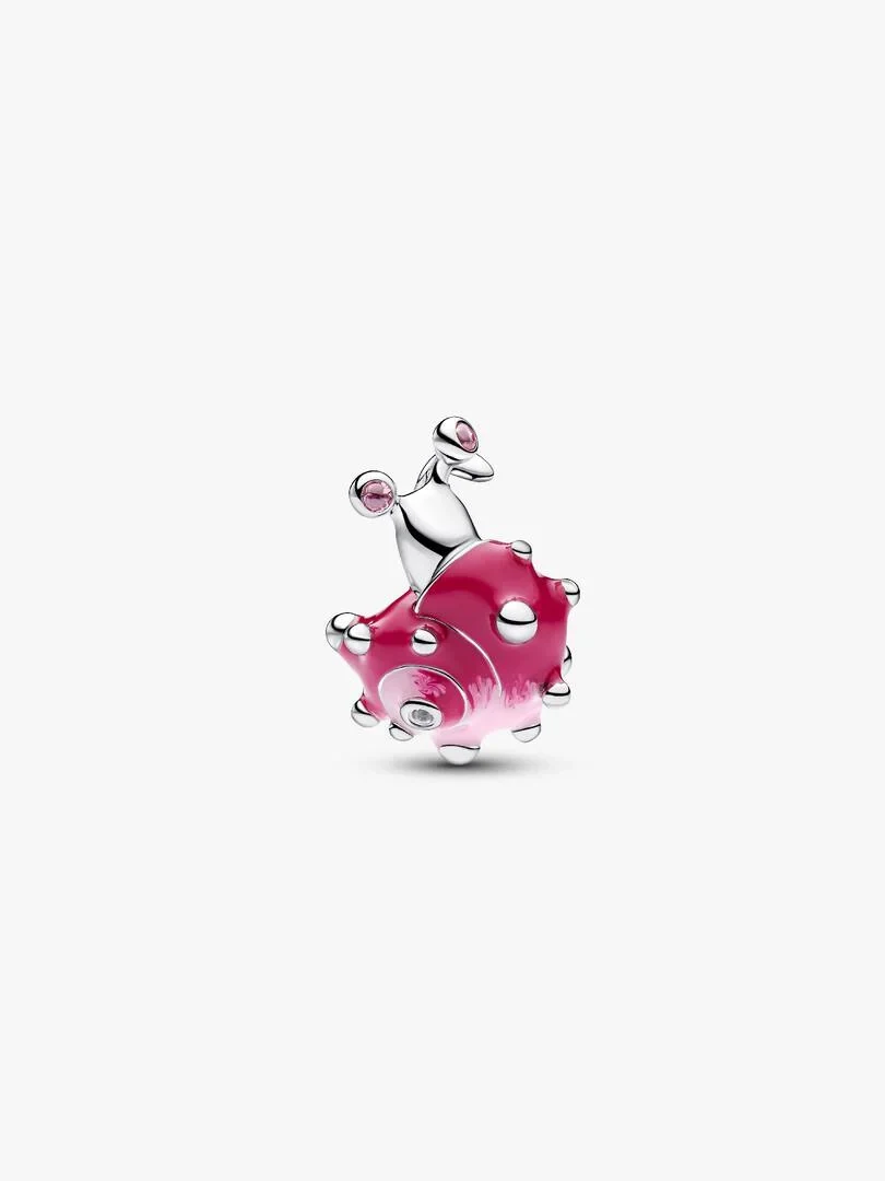 Silver snail charm with pink enamel, side view on a white background.