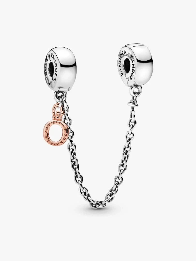 Chaîne de sécurité bicolore avec pendentif couronne, vue de face sur fond blanc.