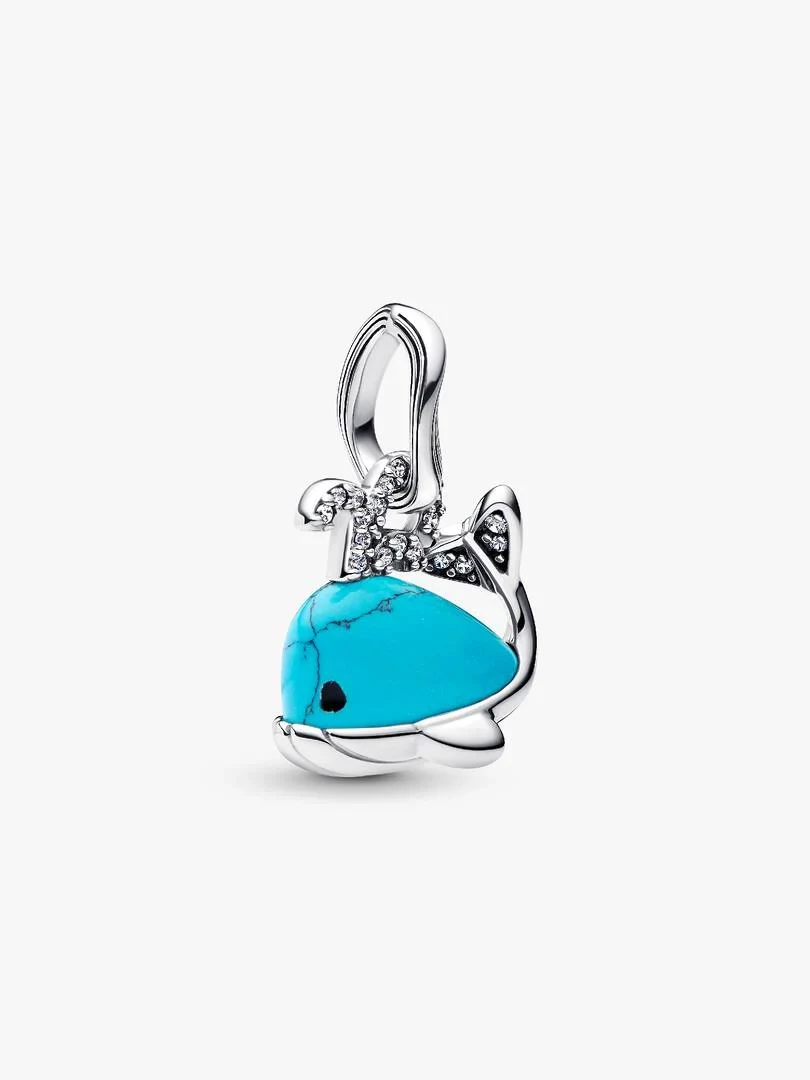 Whale charm in silver with turquoise enamel, front view on a white background.