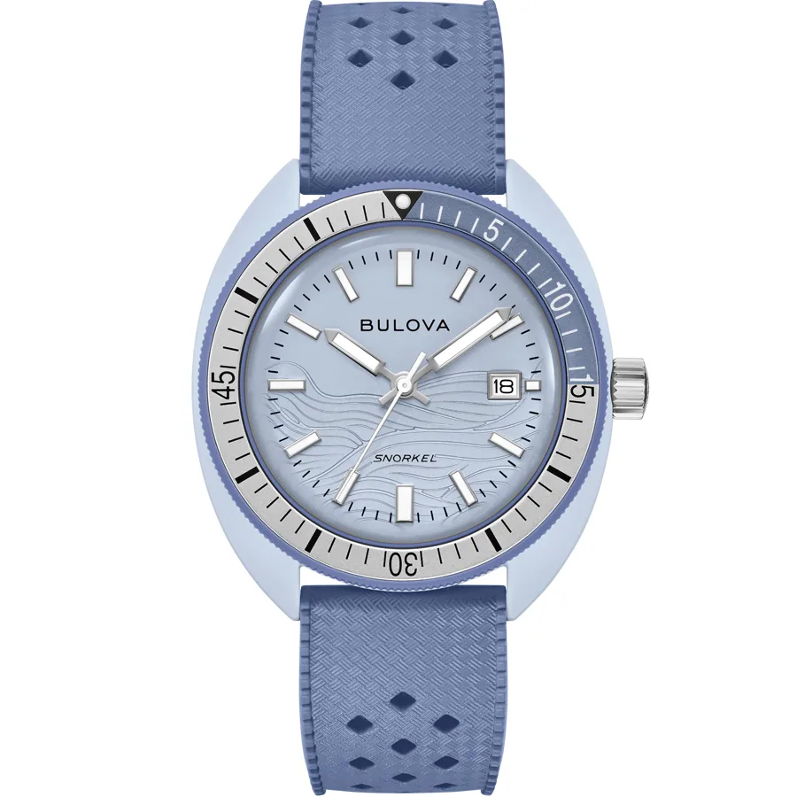 Reloj de esfera y caja azul con correa de caucho perforada, vista frontal sobre fondo blanco.