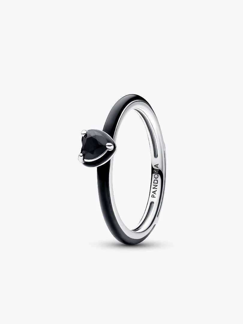 Heart-shaped black stone ring, side angle view on a white background.