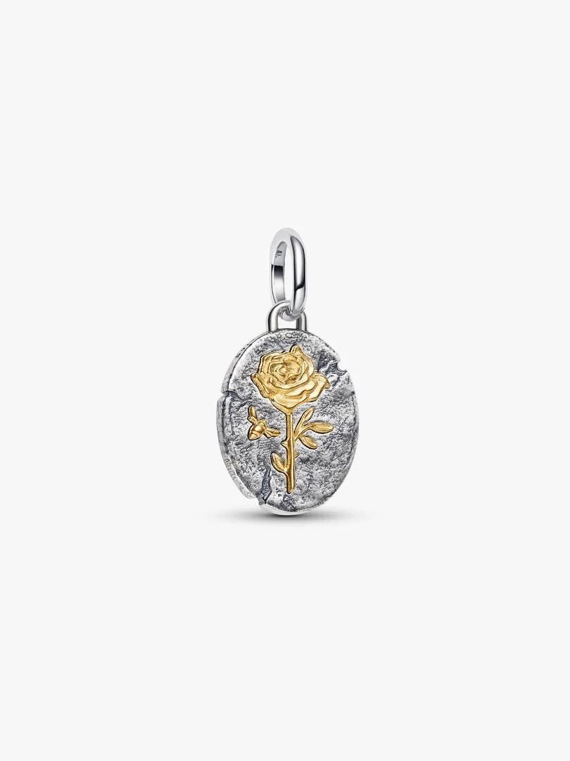 Medallion charm with gold rose relief, front view on a white background.