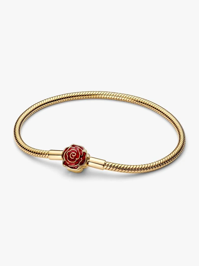 Gold snake chain bracelet with red enamel rose clasp, front view on a white background.