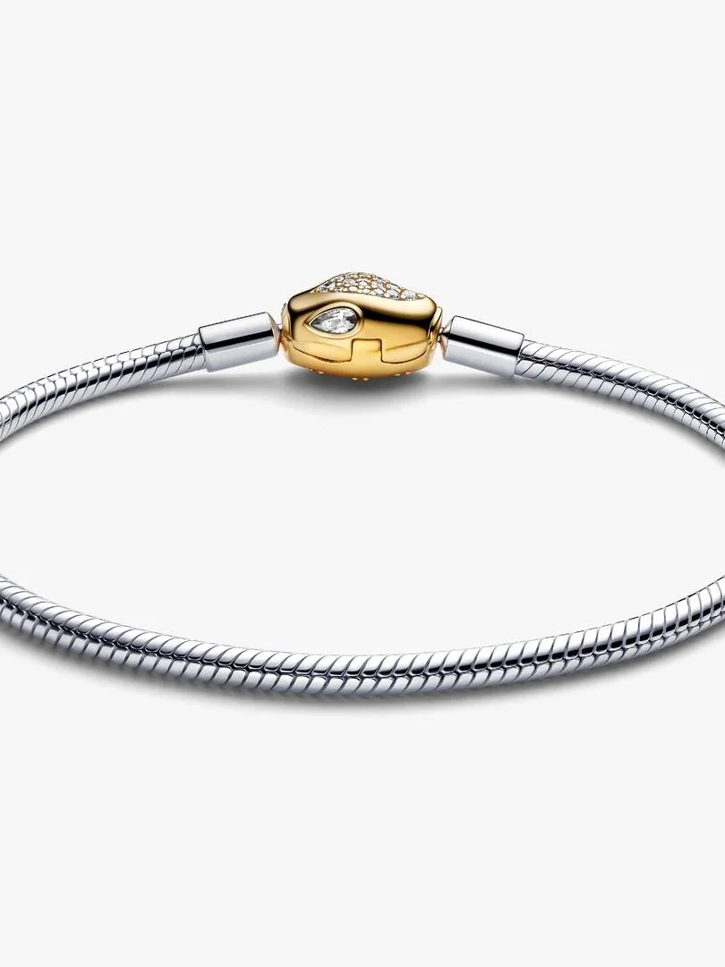 Front view of the bracelet on a white background, focusing on the gold snake-head clasp with cubic zirconia.
