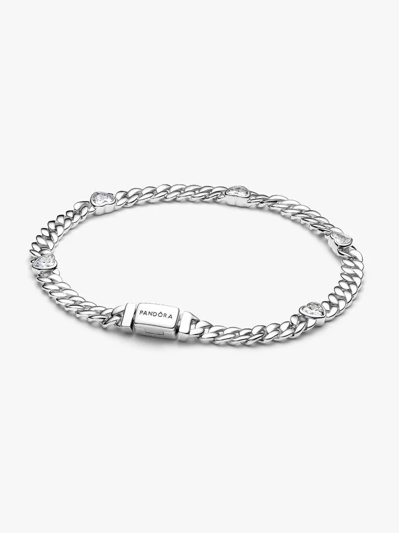 Cuban link bracelet viewed from a high angle, white background, detail of the branded clasp.