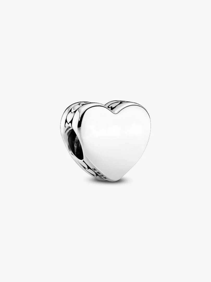 Silver heart charm shown from a side angle, white background, featuring S925 hallmark detail.