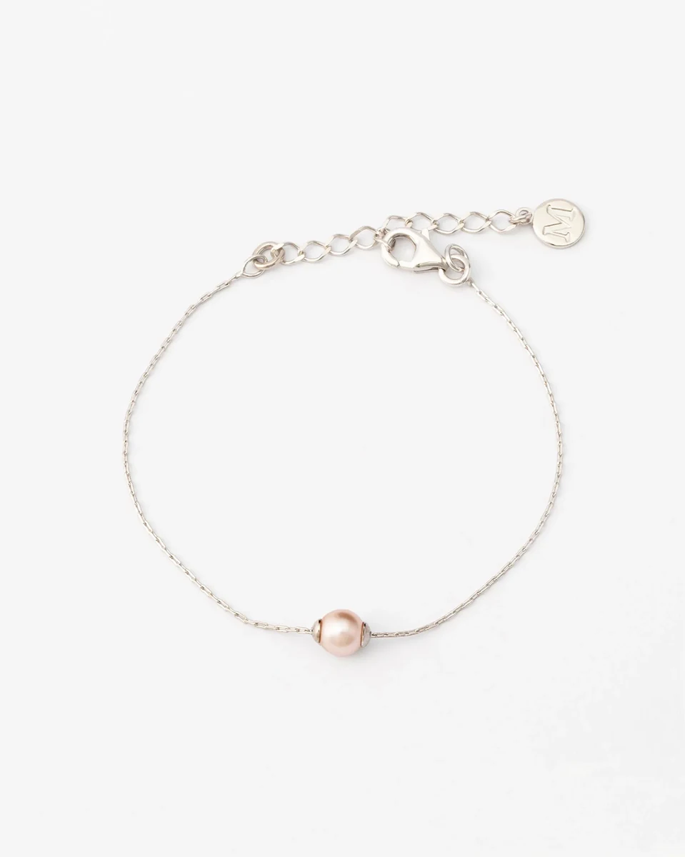 Silver bracelet with pink pearl, front view on white background, showing the clasp and chain.