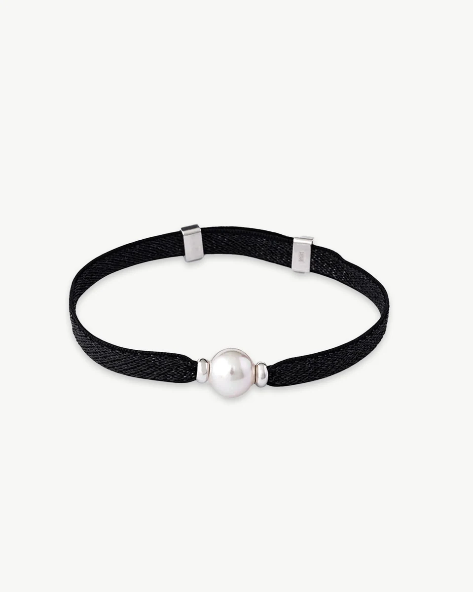 Black thread bracelet with central white pearl, front view on a white background.