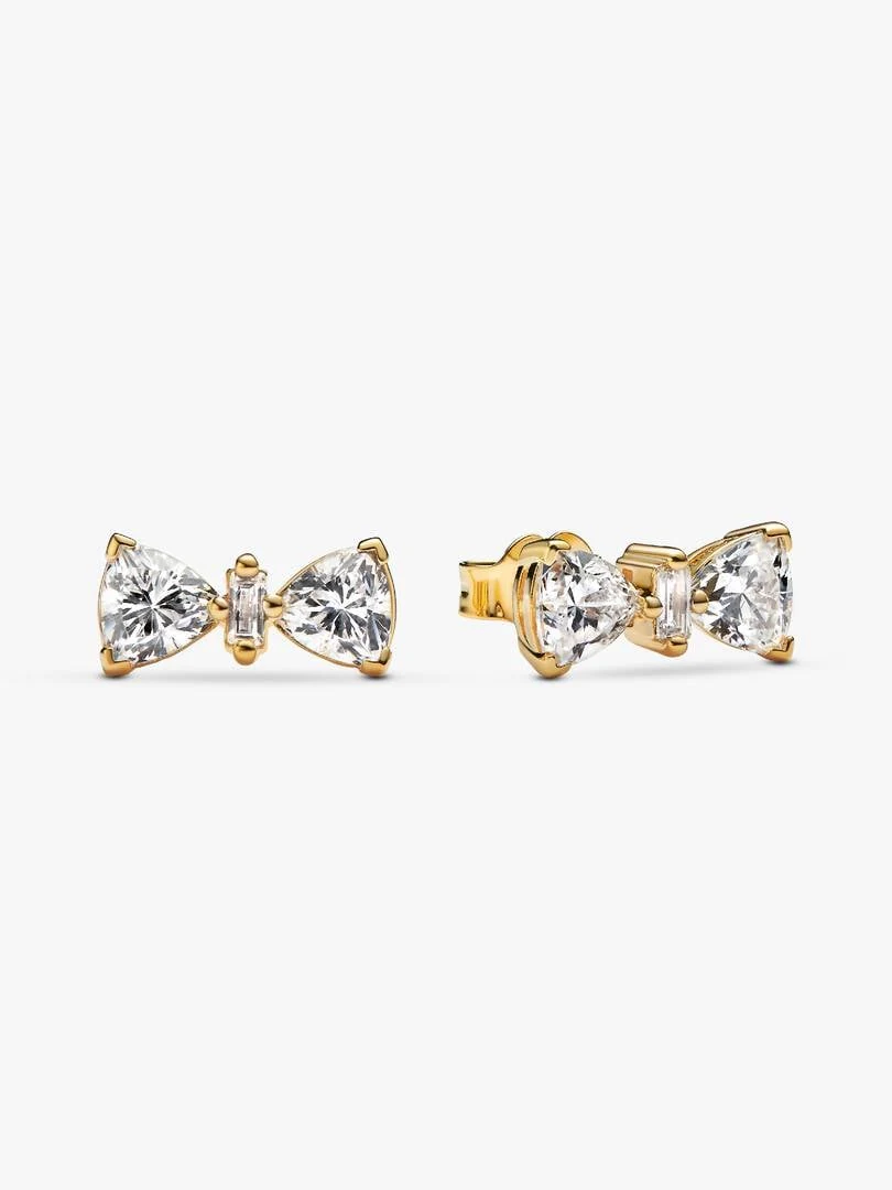 Pair of bow stud earrings with cubic zirconia, front and side view on a white background.