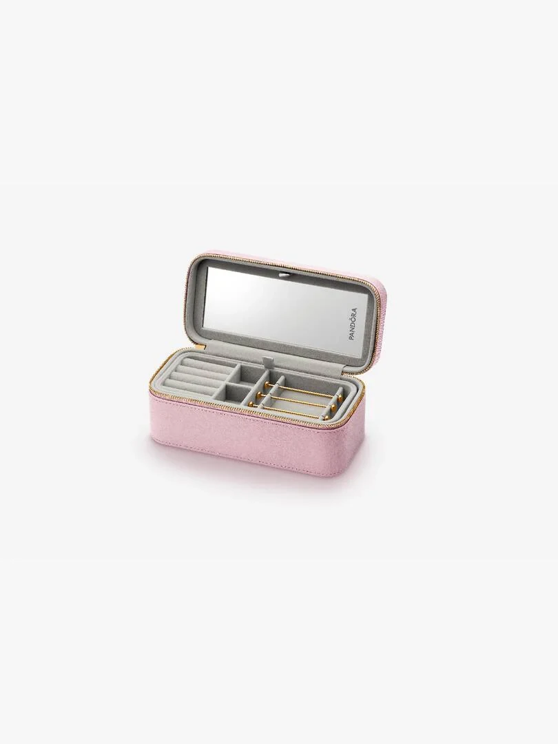 Coffret à bijoux rose ouvert avec miroir intérieur et compartiments, vue de trois quarts sur fond blanc.
