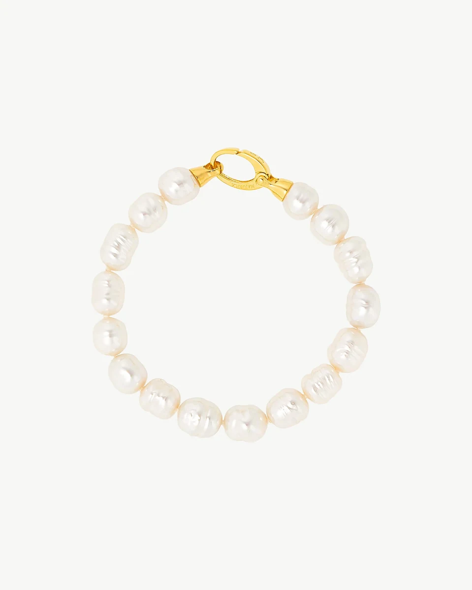 Baroque pearl bracelet arranged in a circle, front view on a pure white background.