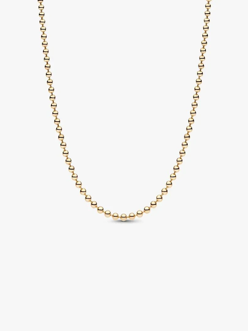 Gold bead necklace arranged in a U-shape on a white background, full frontal view.