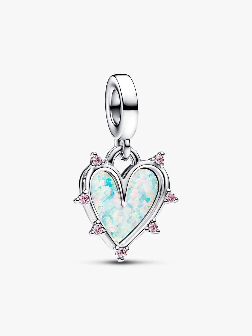 Heart charm with pink opal and cubic zirconia, front view on white background.