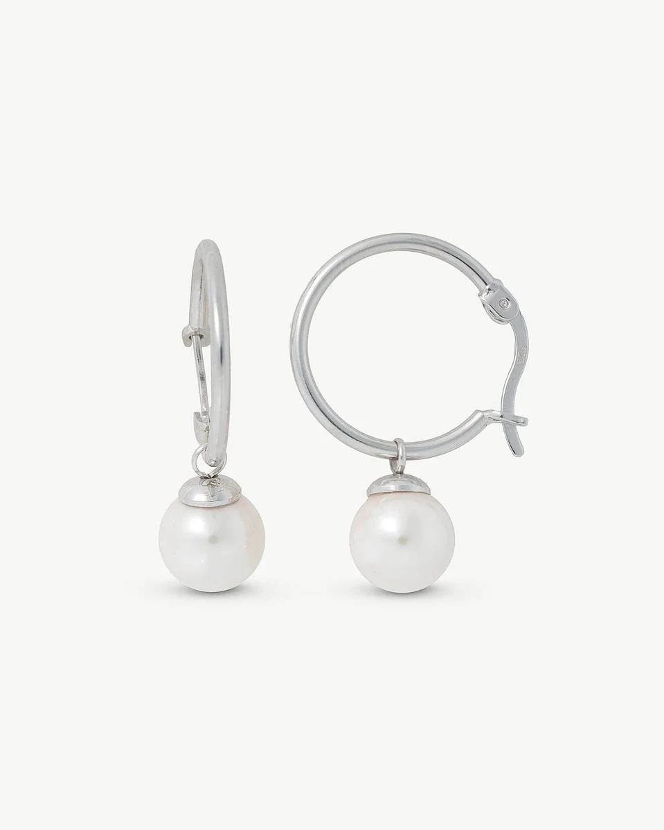Front view of hoop earrings with white pearl, set against a neutral white background.