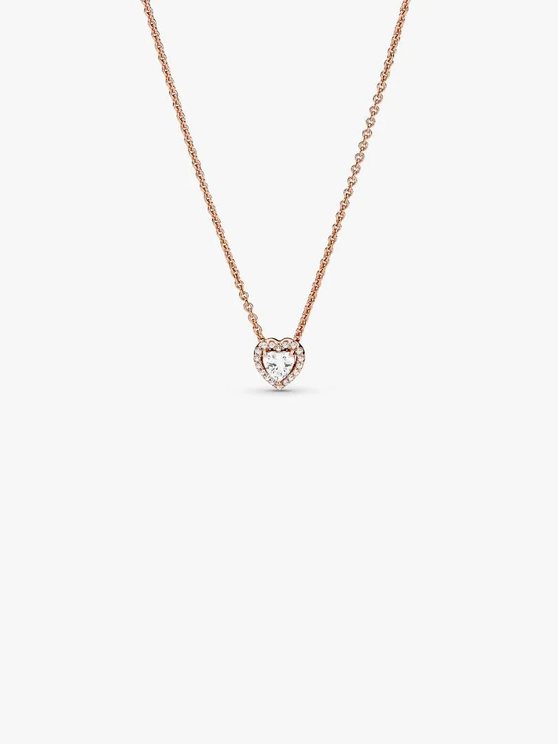 Collier avec pendentif cœur et halo de zircons, vue de face sur fond blanc.