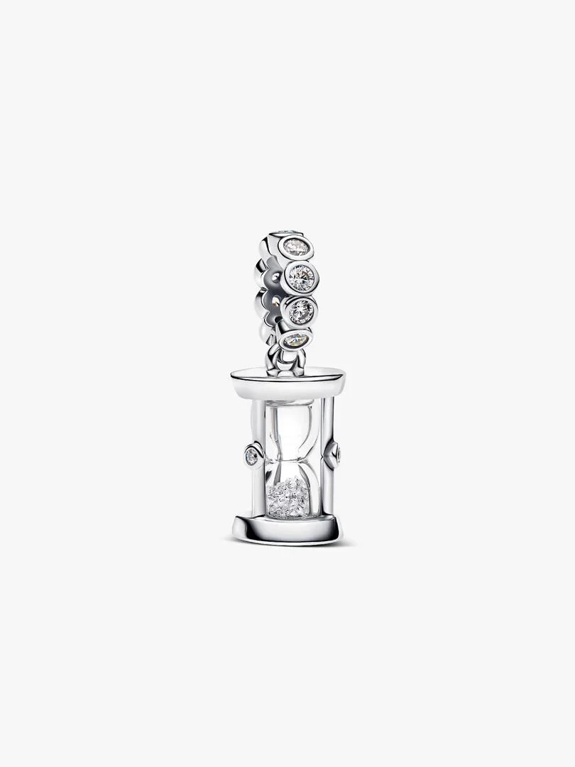 Front view of silver hourglass charm with cubic zirconia stones on a white background.