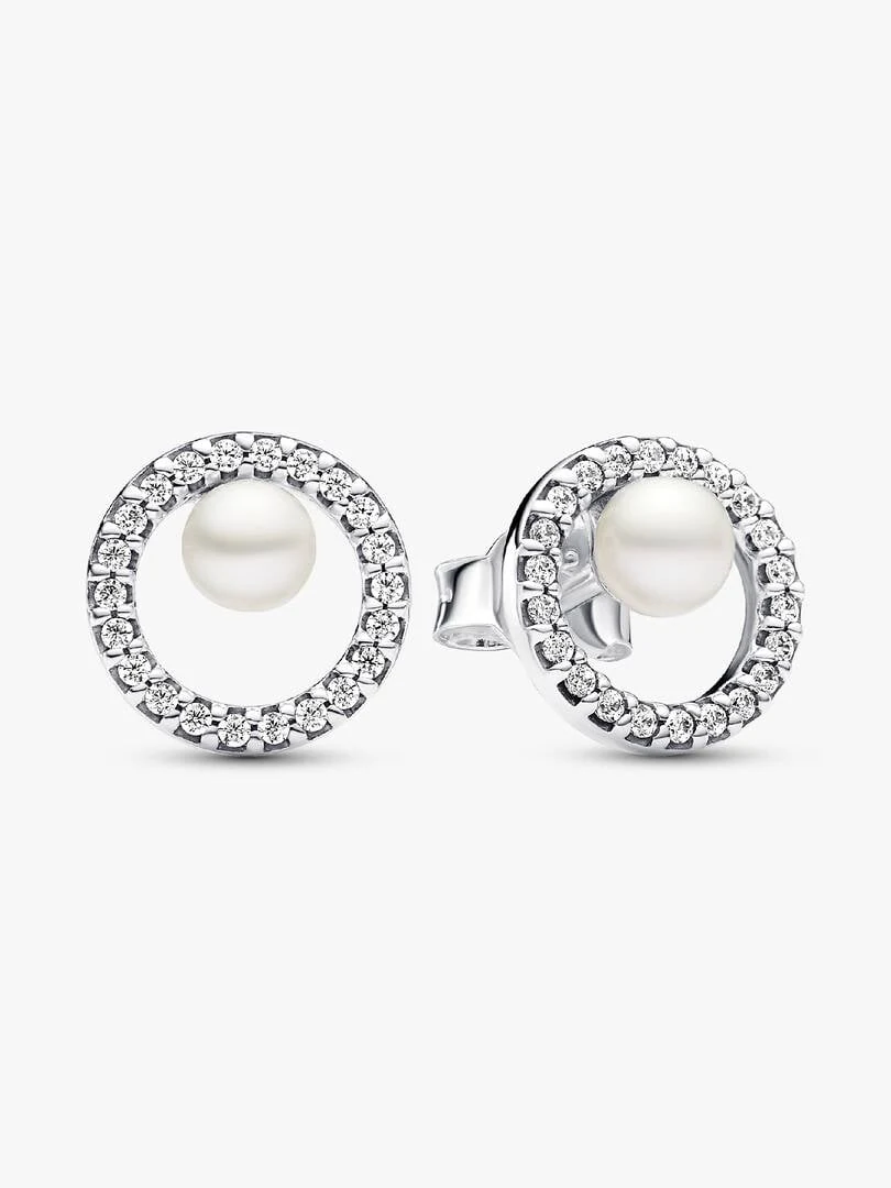 Front view of pearl and pavé stud earrings on a white background, straight-on shot with slight tilt.