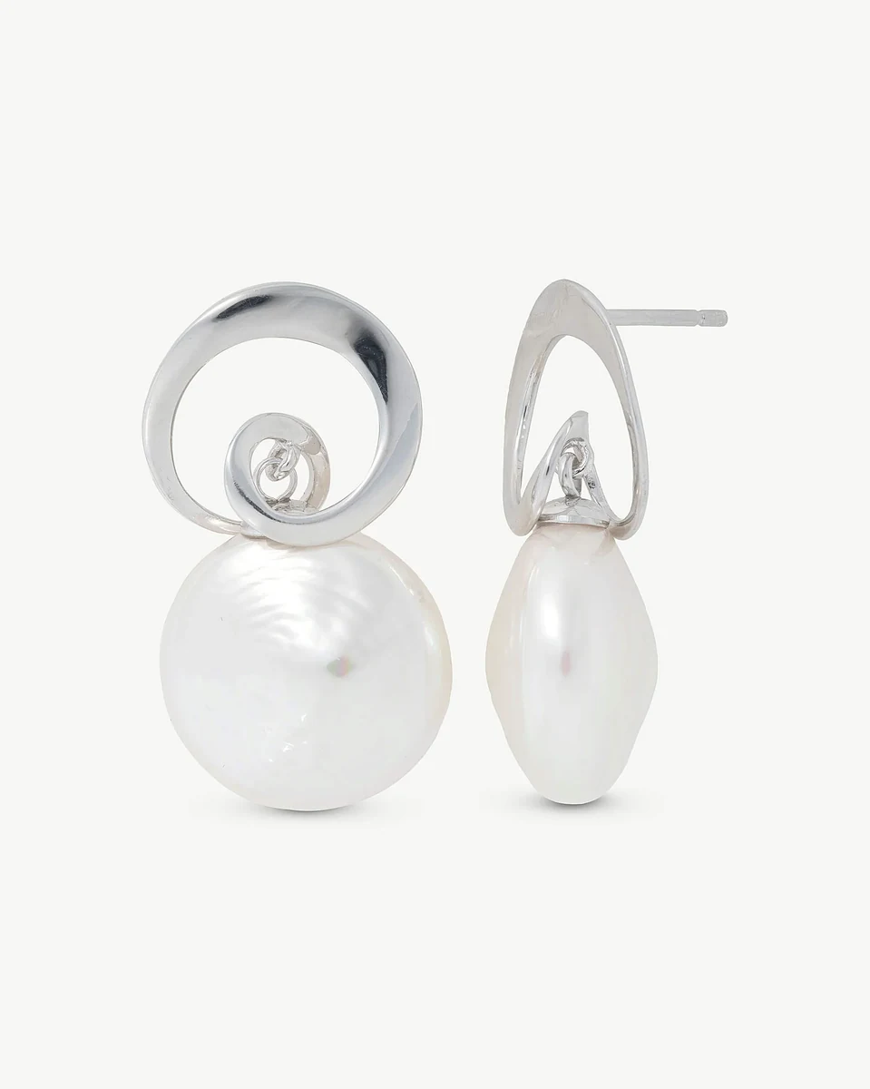 Pair of pearl and silver earrings on a white background, one front view and one side profile.
