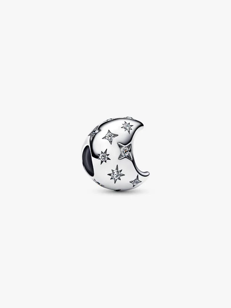 Silver crescent moon charm with cubic zirconia, side view on white background.