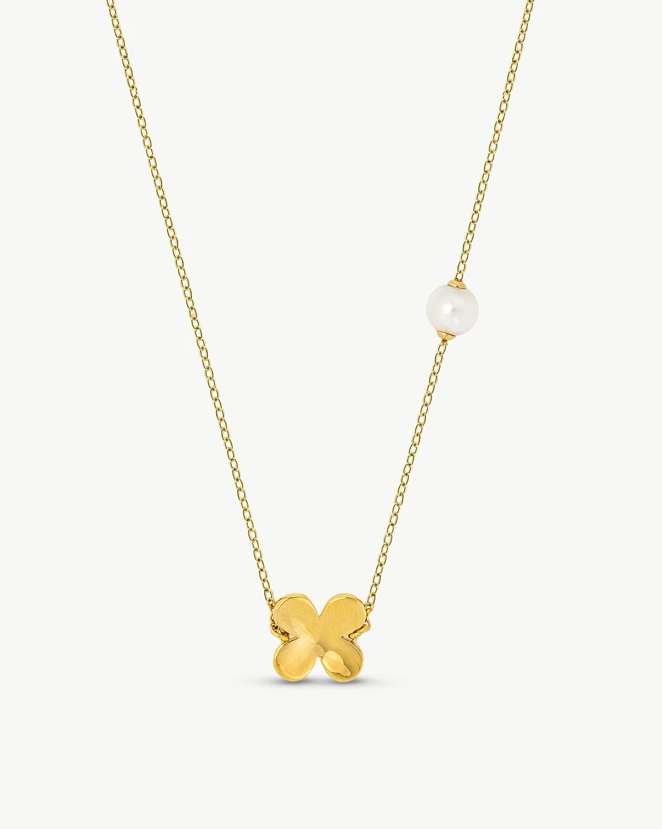Gold necklace with white pearl on white background, full front view of the chain and pendant.