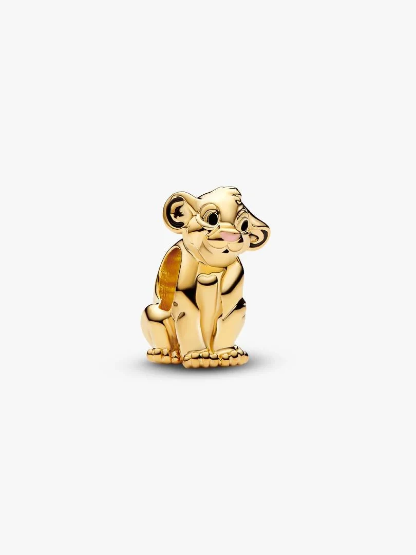 Sitting Simba charm, three-quarter side view, gold-tone finish on white background.