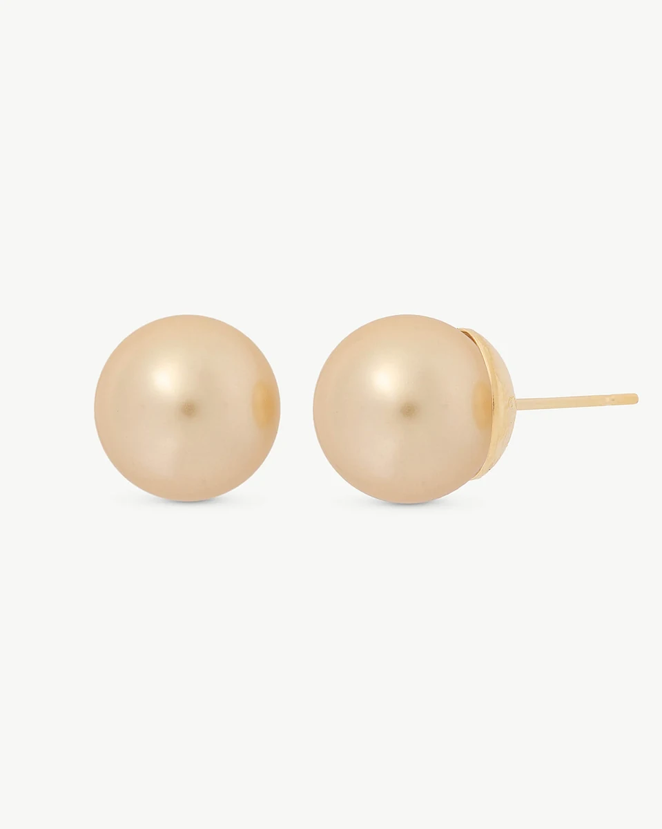 Front view of champagne pearl earrings on a white background, showing the side post.