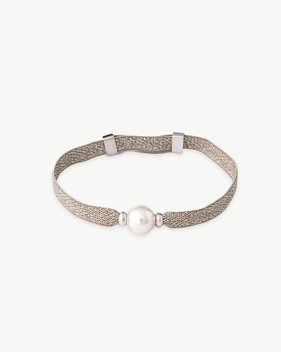 Silver thread bracelet with central pearl, front view on white background.