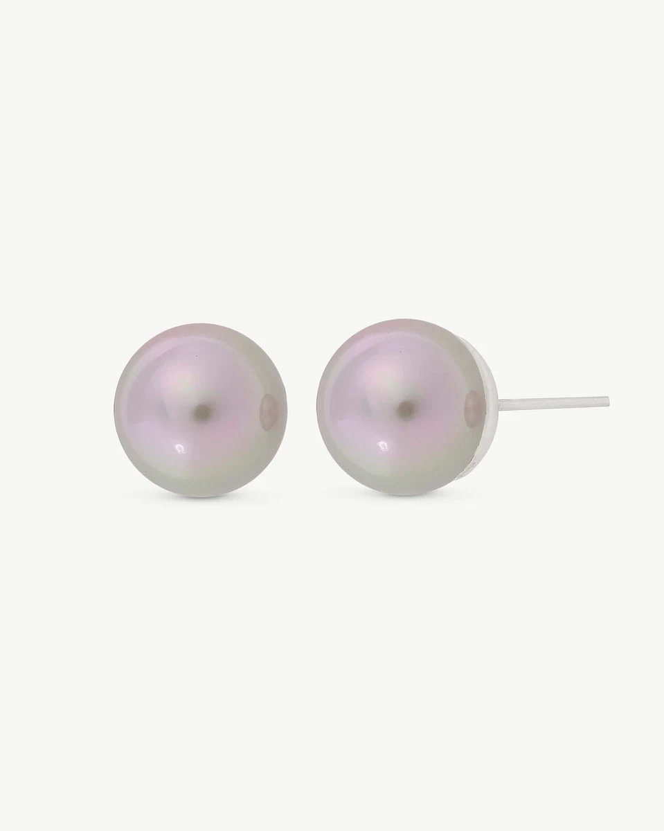 Front view of pearl stud earrings on a white background, showing the silver post profile.
