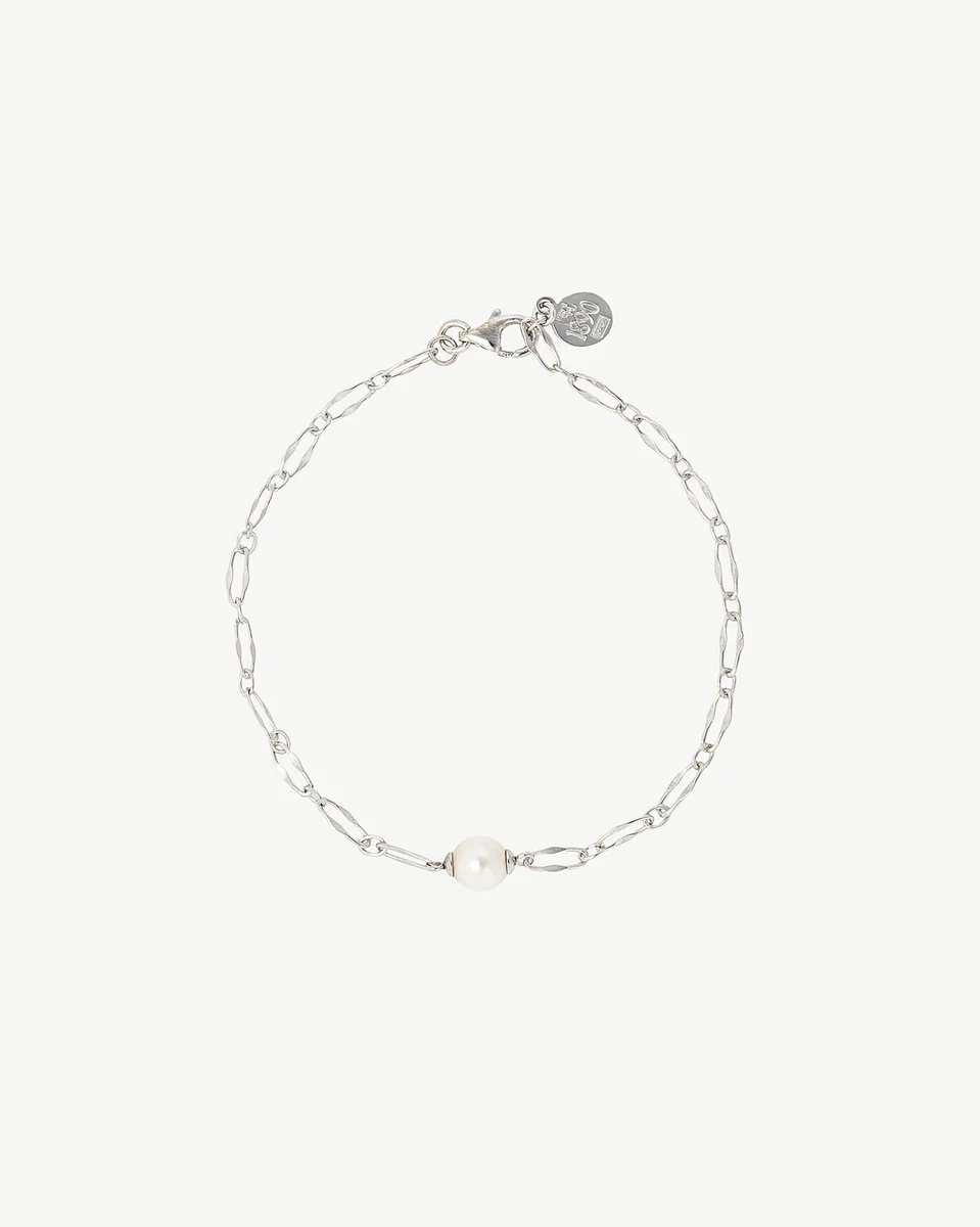 Silver chain bracelet with a white pearl, full front view on a white background.