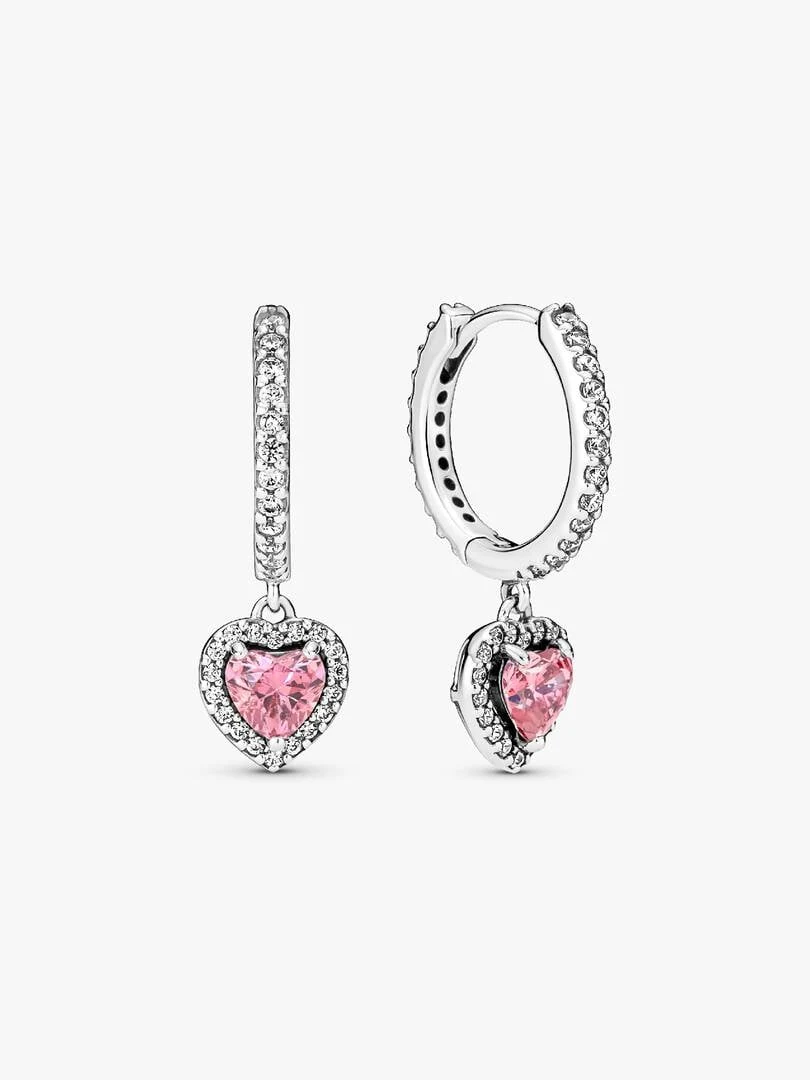 Front view of hoop earrings with pink heart charms, set against a white background.