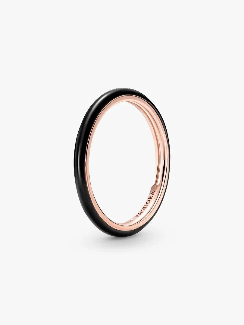 Black enamel ring with 14k rose gold plating, angled view on a white background.
