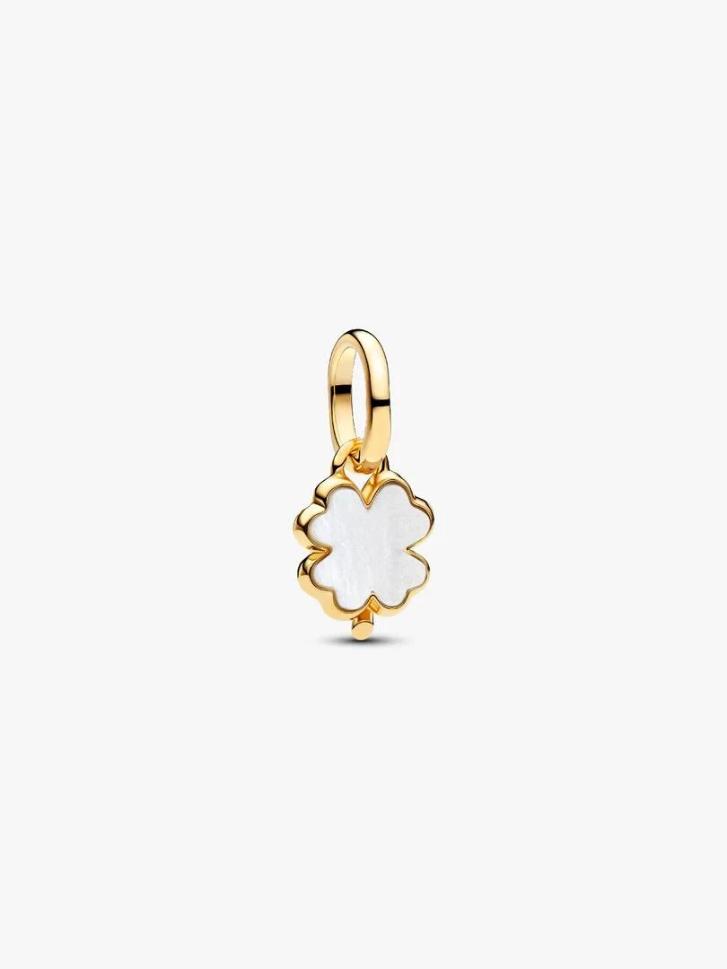 Front view of clover charm with gold plating and white mother-of-pearl, isolated on white background.