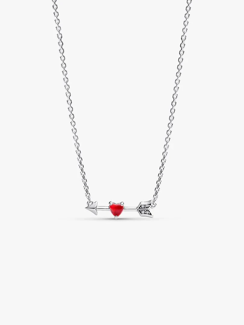 Silver necklace with arrow and red heart pendant, front view on white background.