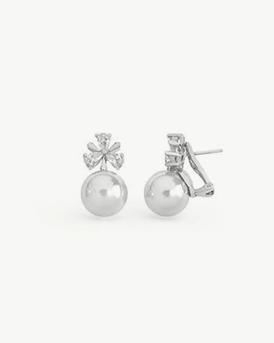 Pair of pearl and cubic zirconia earrings on white background, one front view and one side profile.
