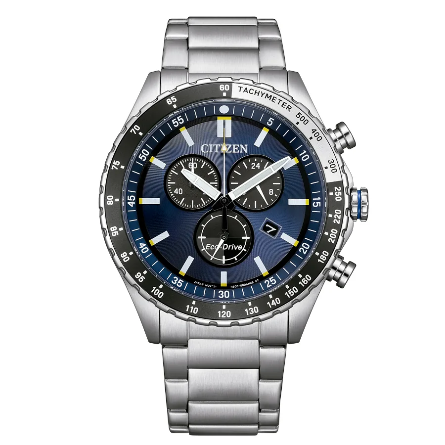 Vista frontal completa del reloj con esfera azul y brazalete de acero, fondo blanco.