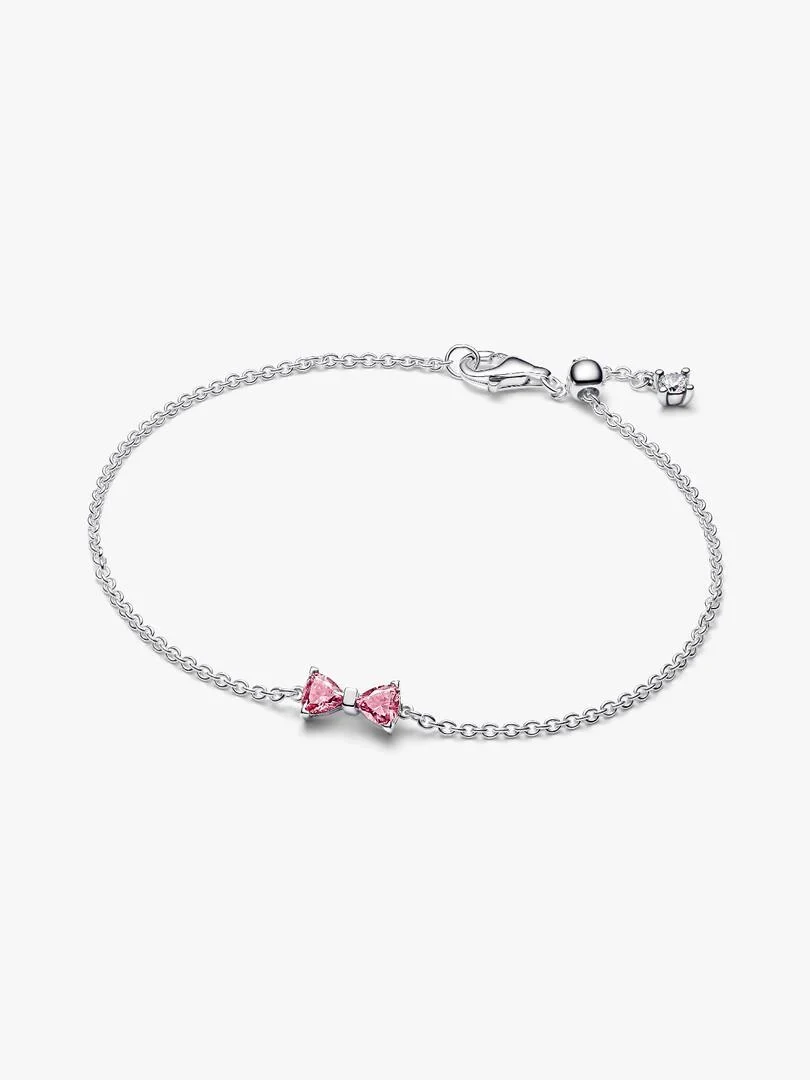 Chain bracelet shown from a top angle, featuring the pink bow detail and clasp on a white background.