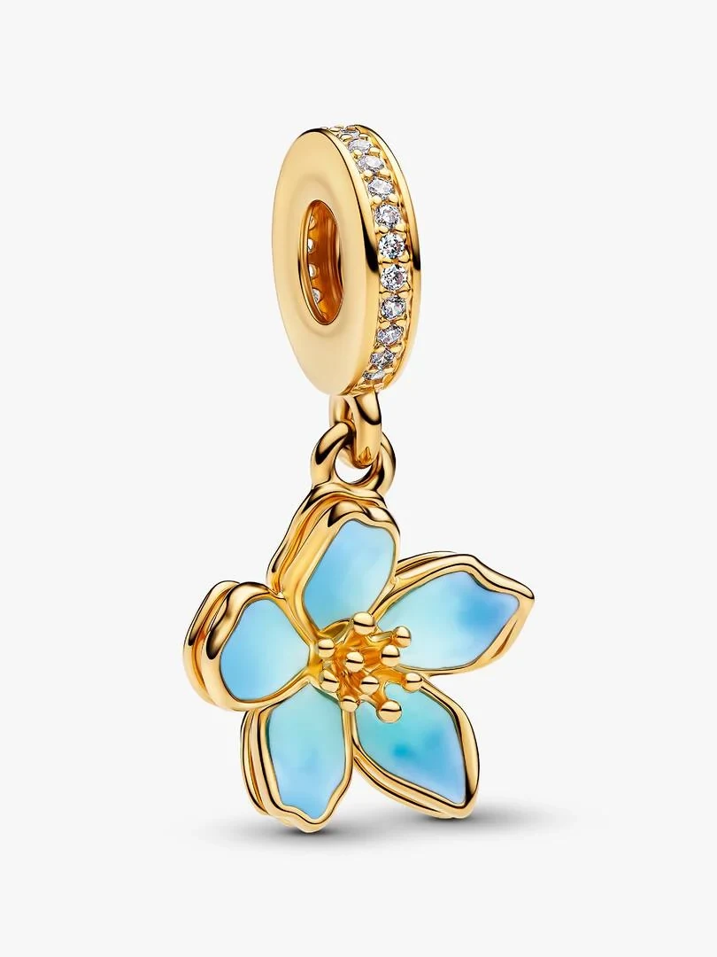 Charm fleur doré avec émail bleu, vue de face complète sur fond blanc.