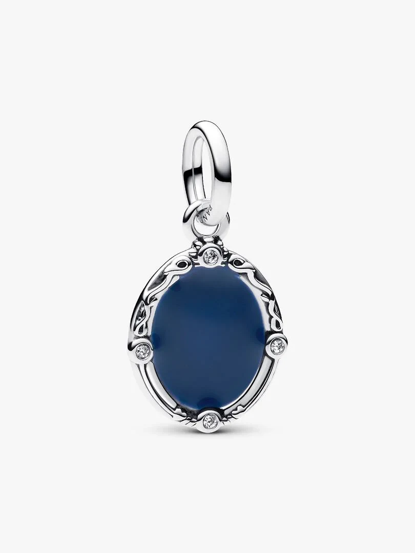 Front view of silver charm with oval blue enamel and cubic zirconia, isolated on white background.