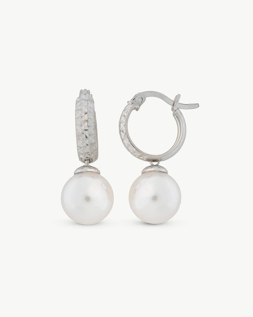Front view of hoop earrings with pearl, white background, showing textured silver finish detail.